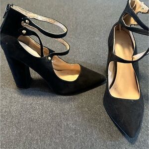 Black pointed toe heels